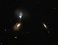 Galaxy pair Zw I 136.<ref>"Galactic soup". ESA/Hubble Picture of the Week. Retrieved 18 August 2014. </ref>