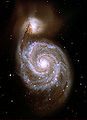The Whirlpool Galaxy with its satellite NGC 5195.