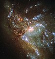 Galaxy NGC 6052 merging into a single structure.<ref>"Two become one". Retrieved 28 December 2015. </ref>