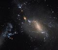NGC 3447 comprises a couple of interacting galaxies.<ref>"Defying cosmic convention". www.spacetelescope.org. Retrieved 20 March 2017. </ref>